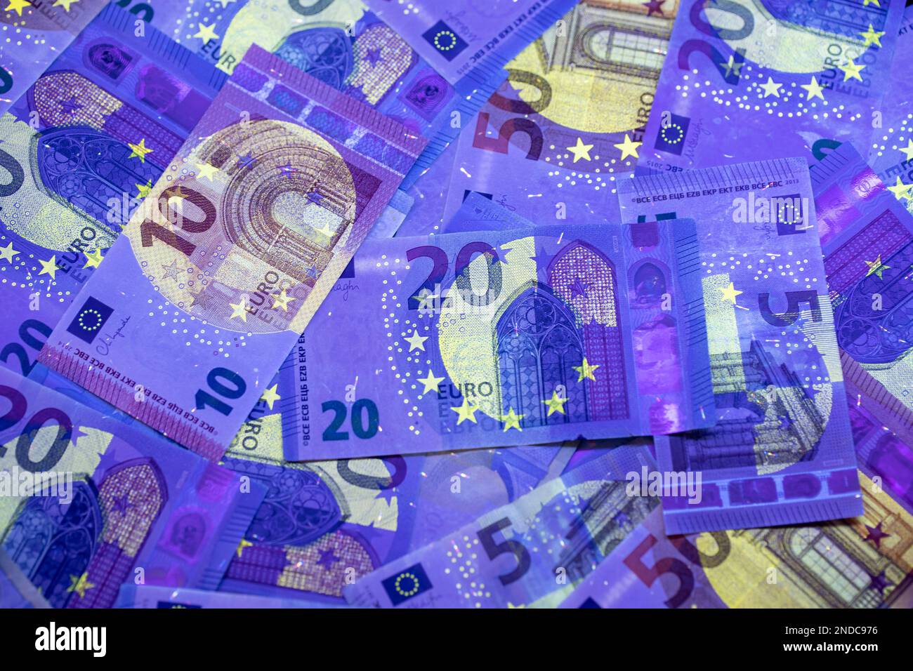 Currency in violet hi-res stock photography and images - Alamy