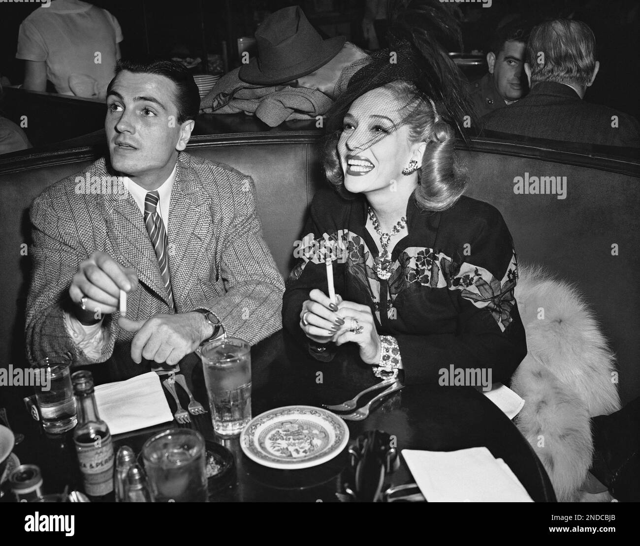 Movie actress Lupe Velez, with Harold Ramond, French actor at a 