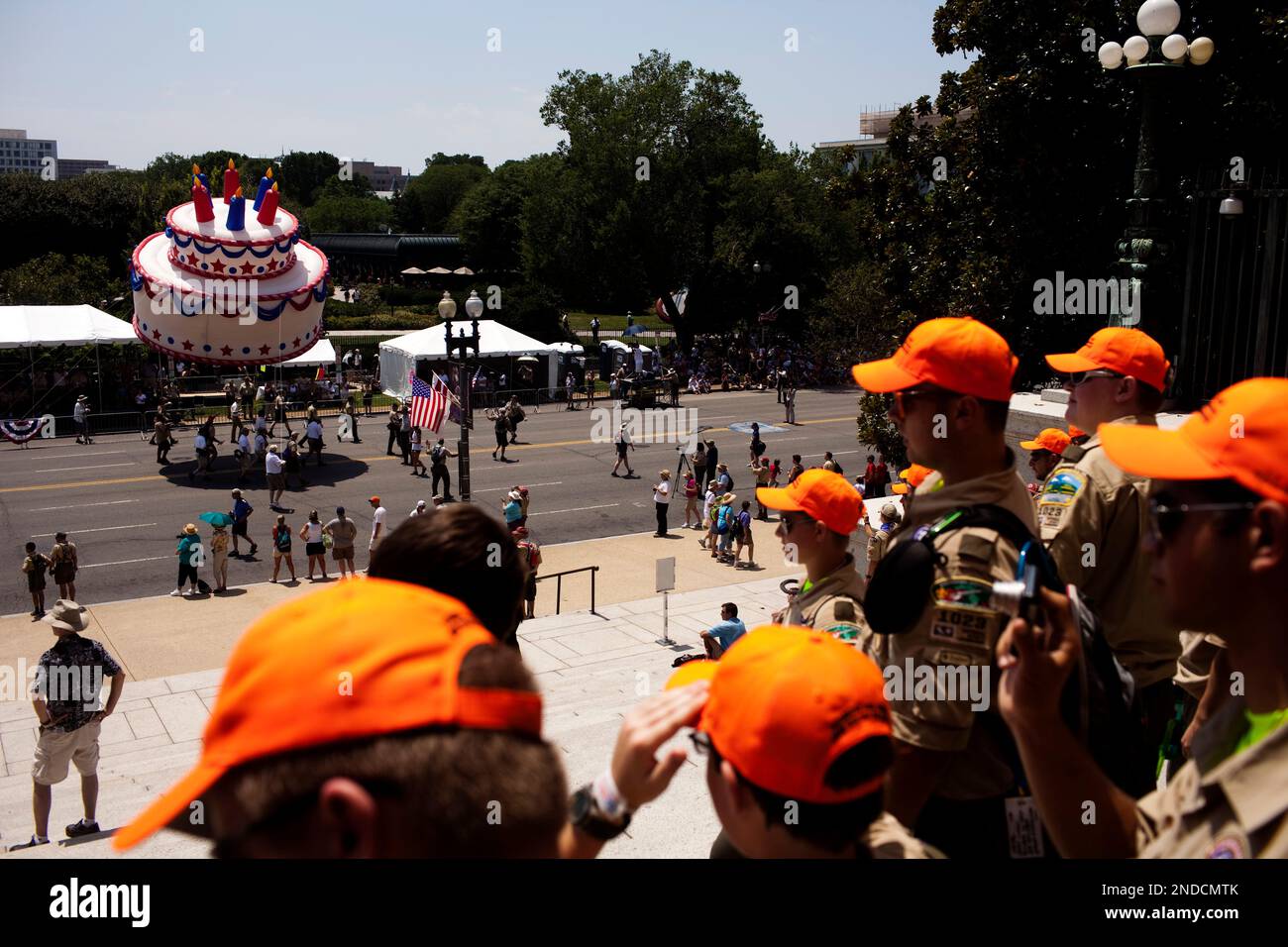 Boy Scout Troops 1023 and 1024 from Waukeshaw, Wis., watch the 100th