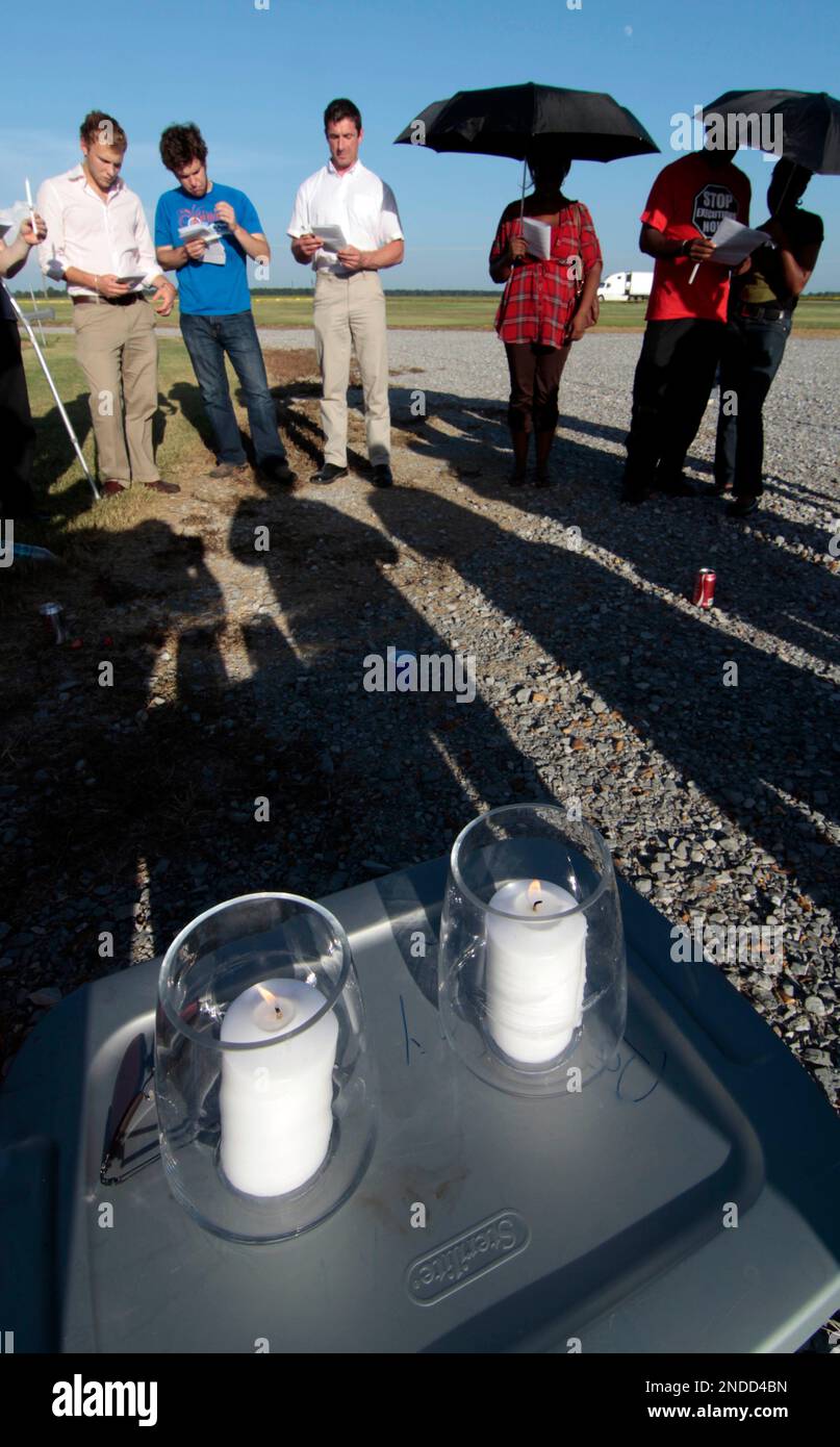 Candles representing death row inmate Joseph Daniel Burns and his