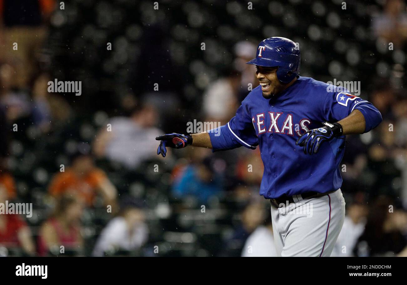 Texas Rangers Nelson Cruz celebrates after hitting a solo homerun during  the seventh inning of game 6 of the World Series against the St. Louis  Cardinals in St. Louis on October 27