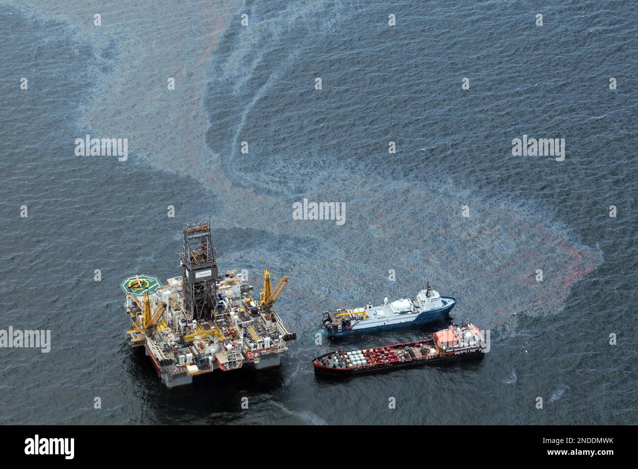 Workboats operate near the Transocean Development Drilling Rig II at ...