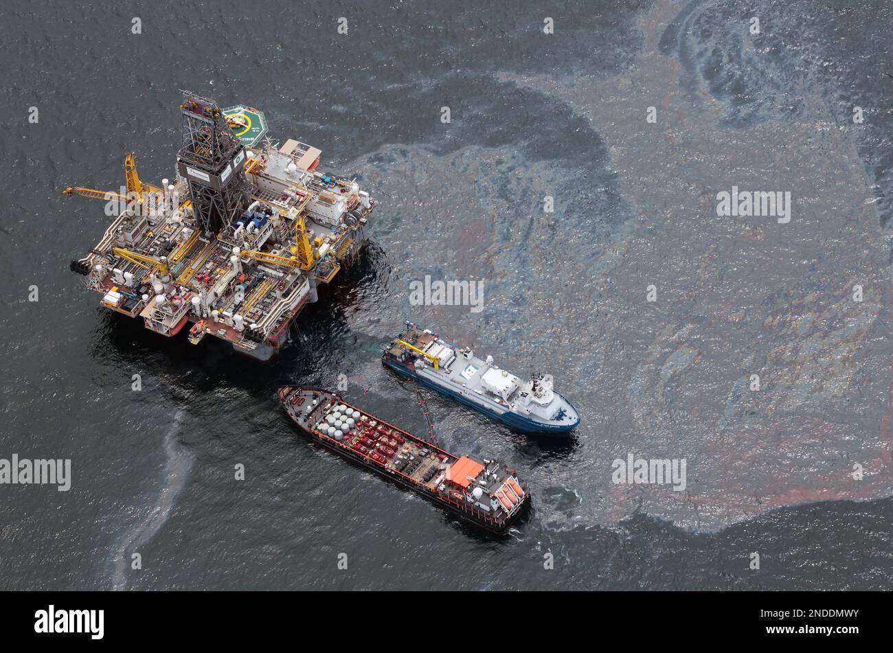 Workboats operate near the Transocean Development Drilling Rig II at ...