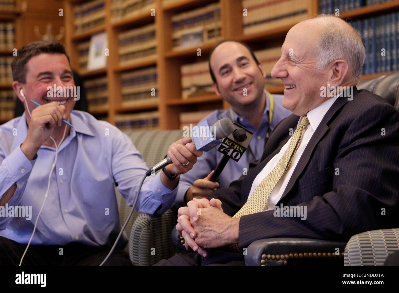 California Supreme Court Chief Justice Ronald George right laughs as he speaks to members of the media in his office in San Francisco Wednesday July 14 2010. George announced on Wednesday July