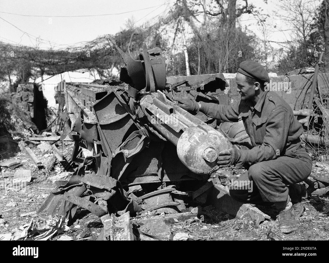 Canadian sapper shows where the piston pits into tube which runs the ...