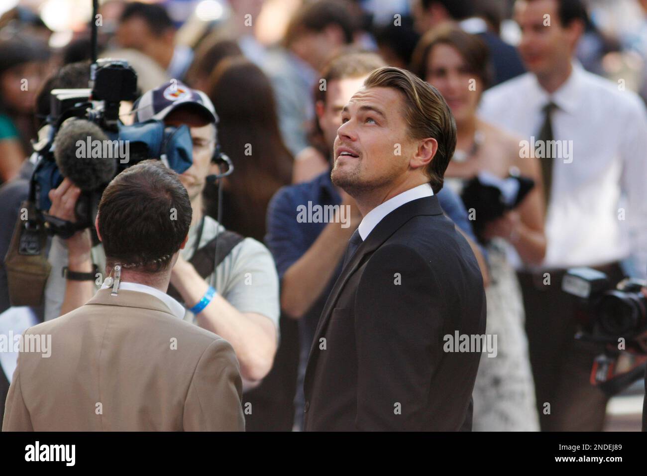 Inception British Actor Cast member U.S. actor Leonardo DiCaprio looks up as he arrives for the ...