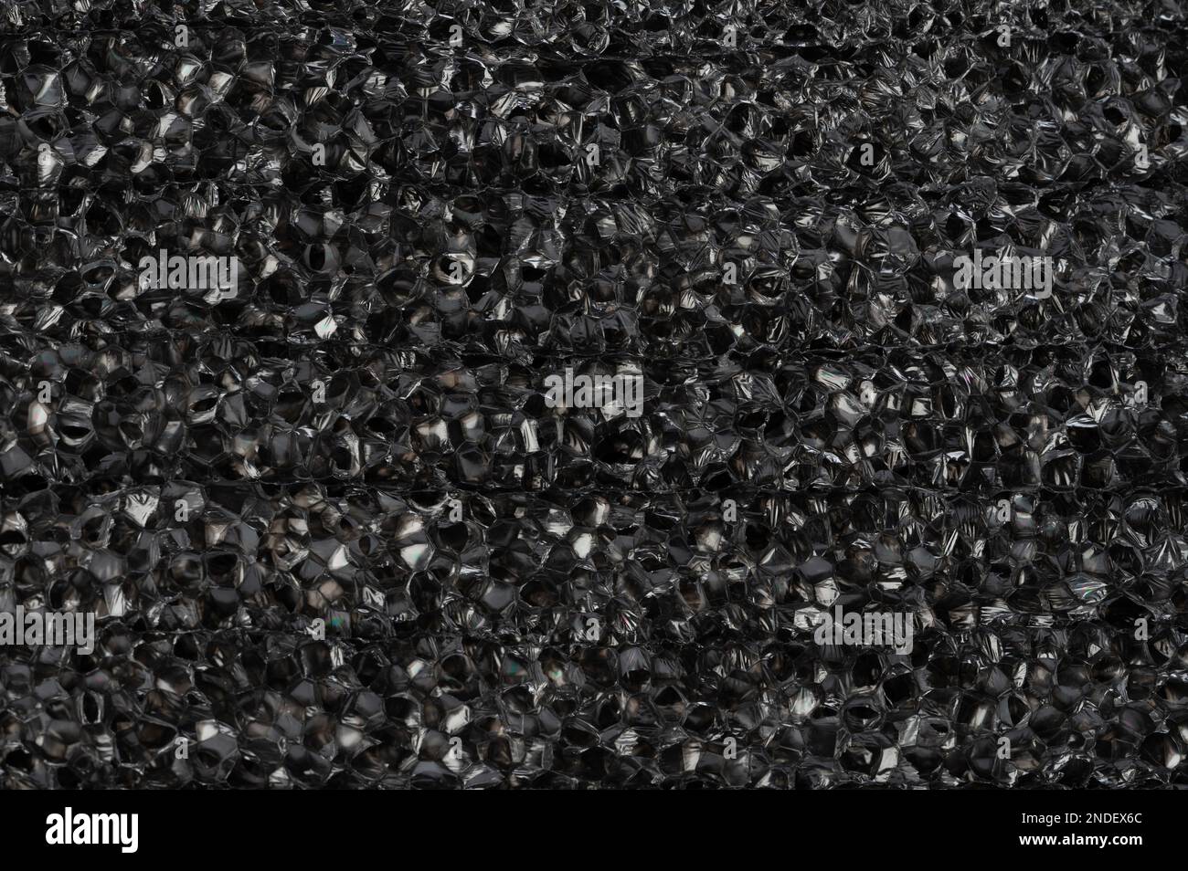 Pattern of black polymer bubbles macro close up view Stock Photo