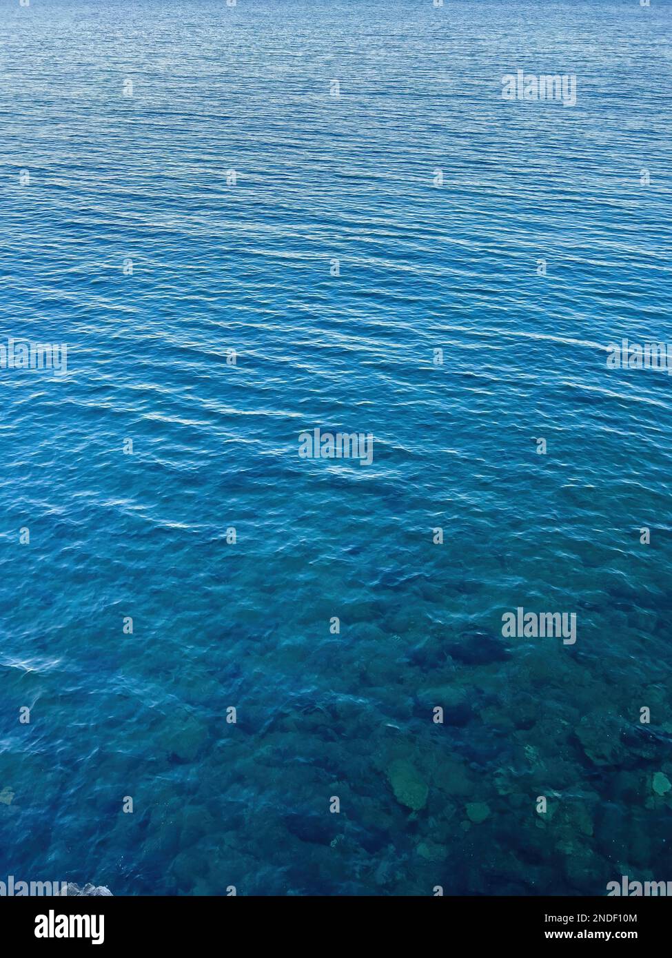 The clear blue sea water surface Stock Photo - Alamy