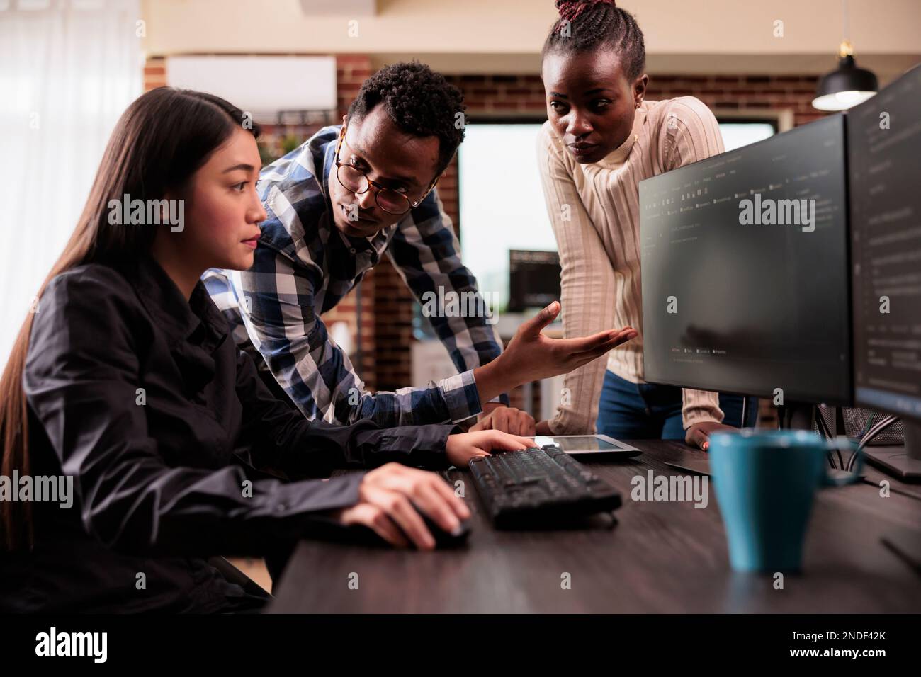 Diverse ai cloud programers talking about html script, looking at code on computer, working on server interface development. Programmers parsing cloud computing project with big data in it agency Stock Photo