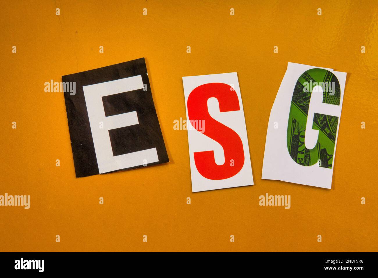 The acronym 'ESG'  (environmental social governance) using cut-out paper letters in the ransom note effect typography, USA Stock Photo