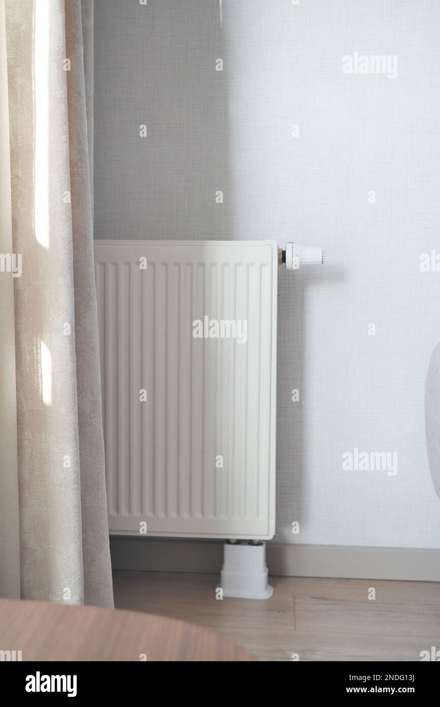 heating radiator under window in the room Stock Photo Alamy