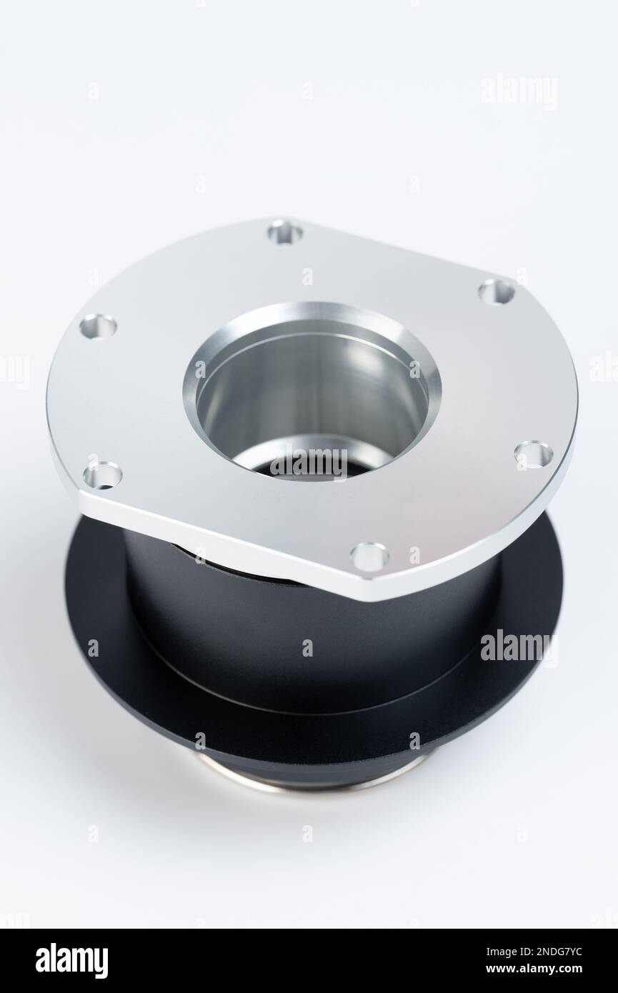 Metal joint pipe part isolated close up view on studio background Stock