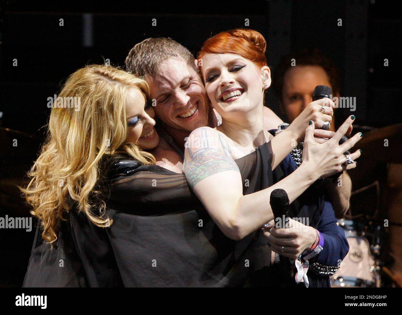 Australian singer Kylie Minogue performs with the Scissor Sisters at