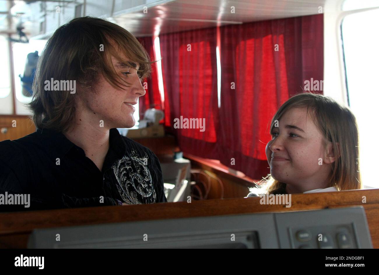 Abby Sunderland, 16, right, reunite with her brother Zac Sunderland(00)