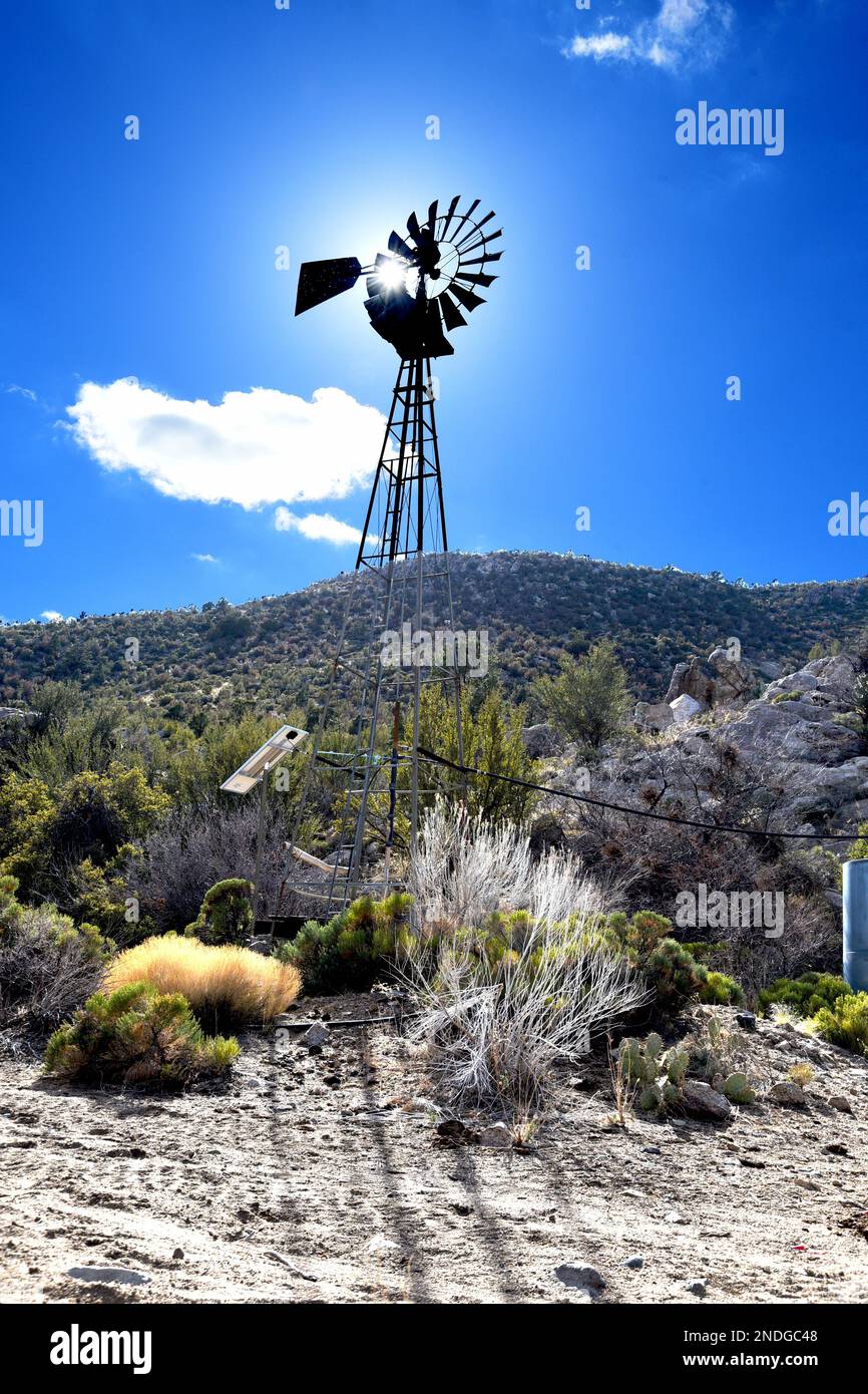 A desert windmill near Kingman, Arizona Stock Photo