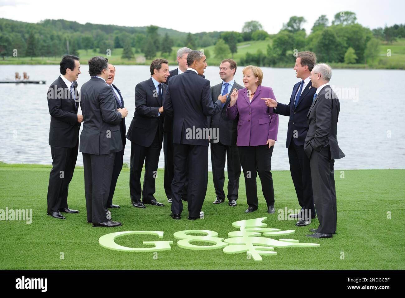 Head of states listen US President Barack Obama (C) after the family picture at the G8 summit on