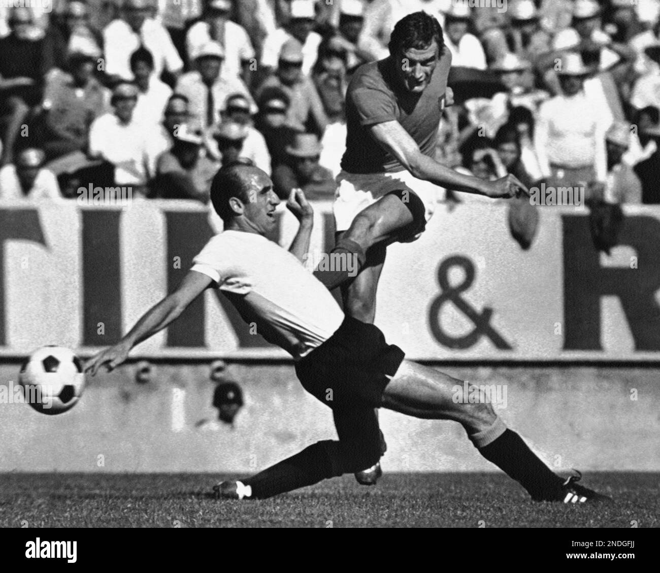 Uruguay’s Alberto Matosa and Italy’s Luigi Riva in action on June 6