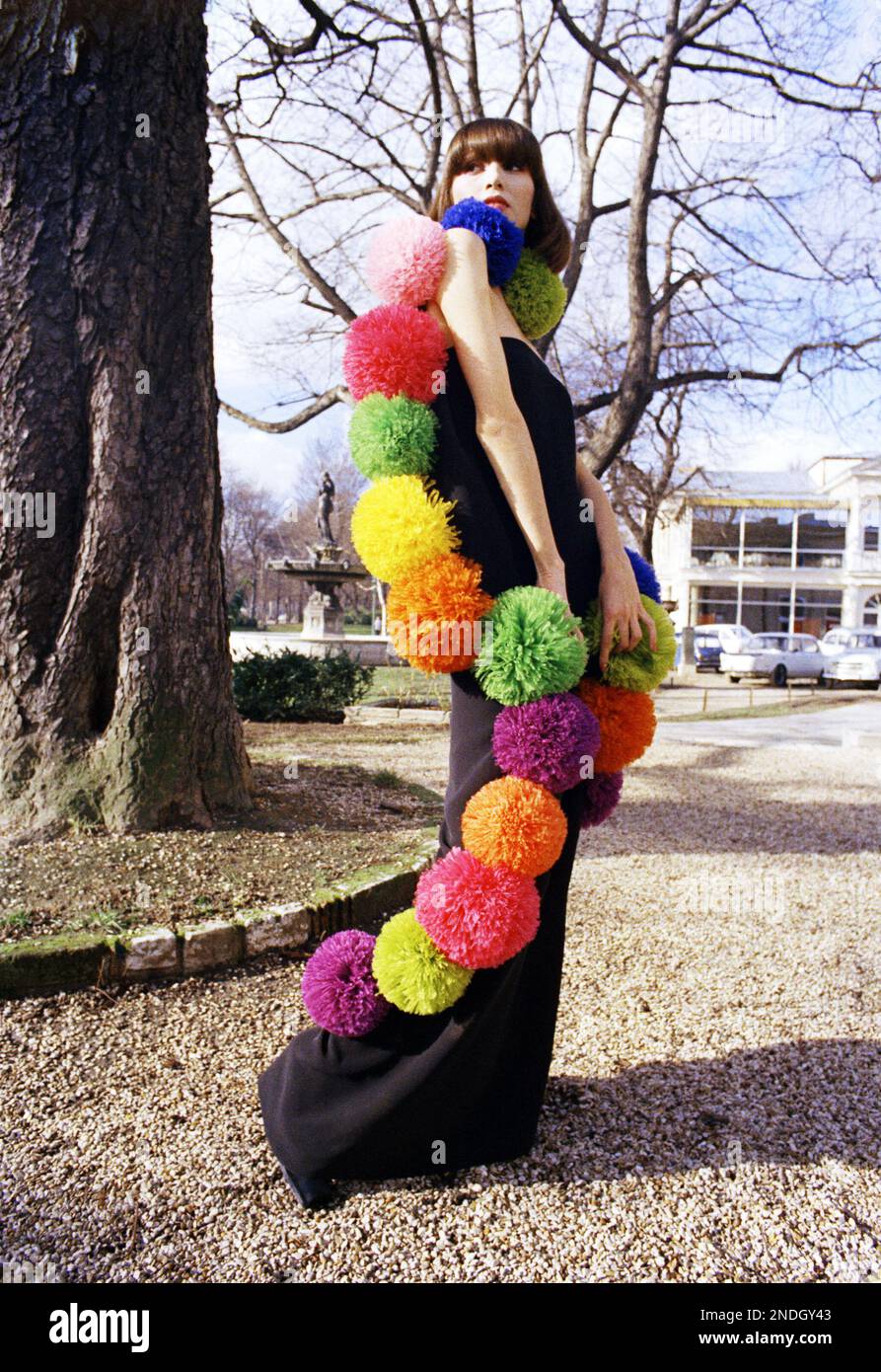 A black chiffon dress in totally bordered Hugh Multicolored ostrich ...