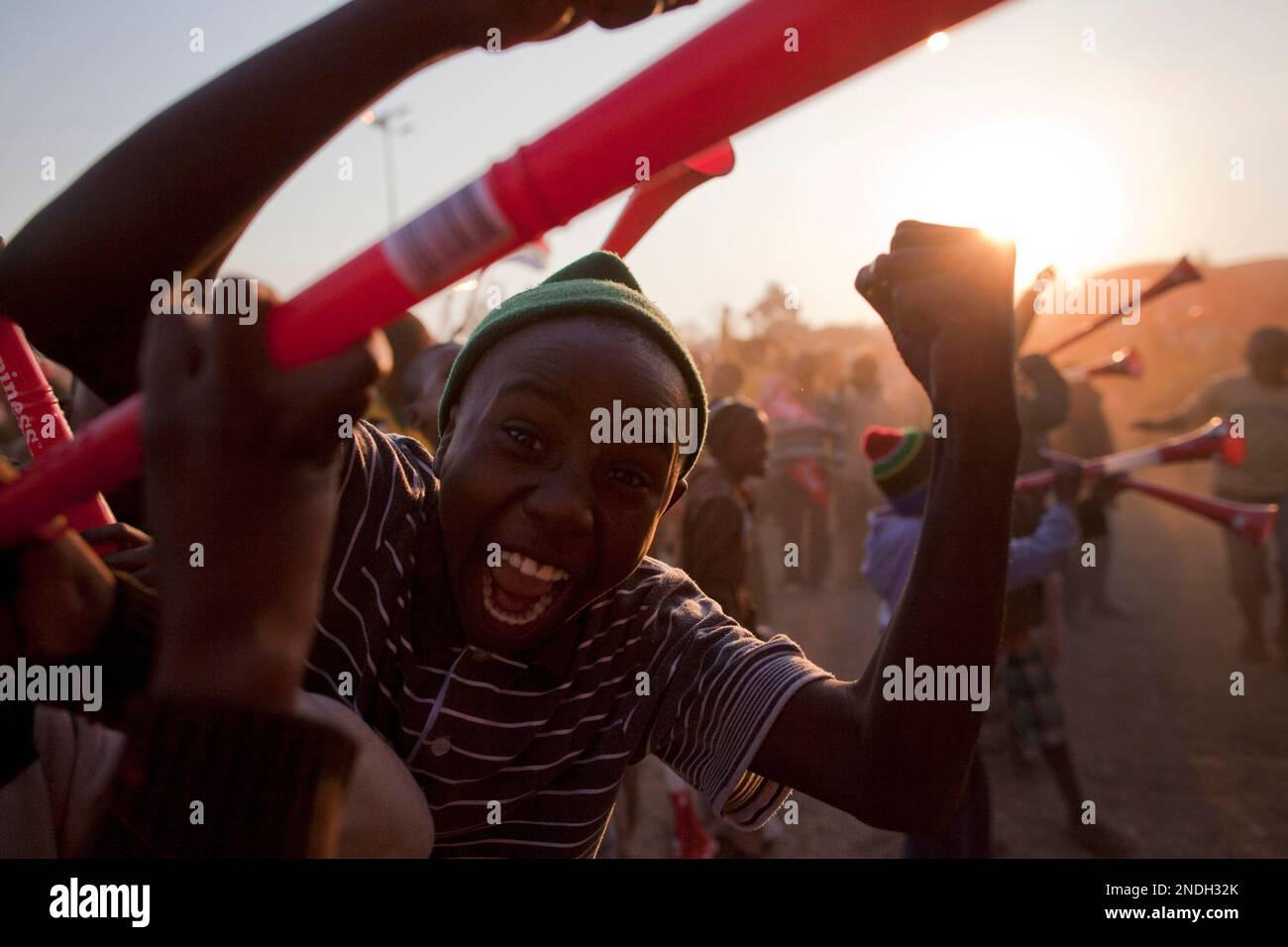 South African soccer fans celebrate scoring goal during the soccer