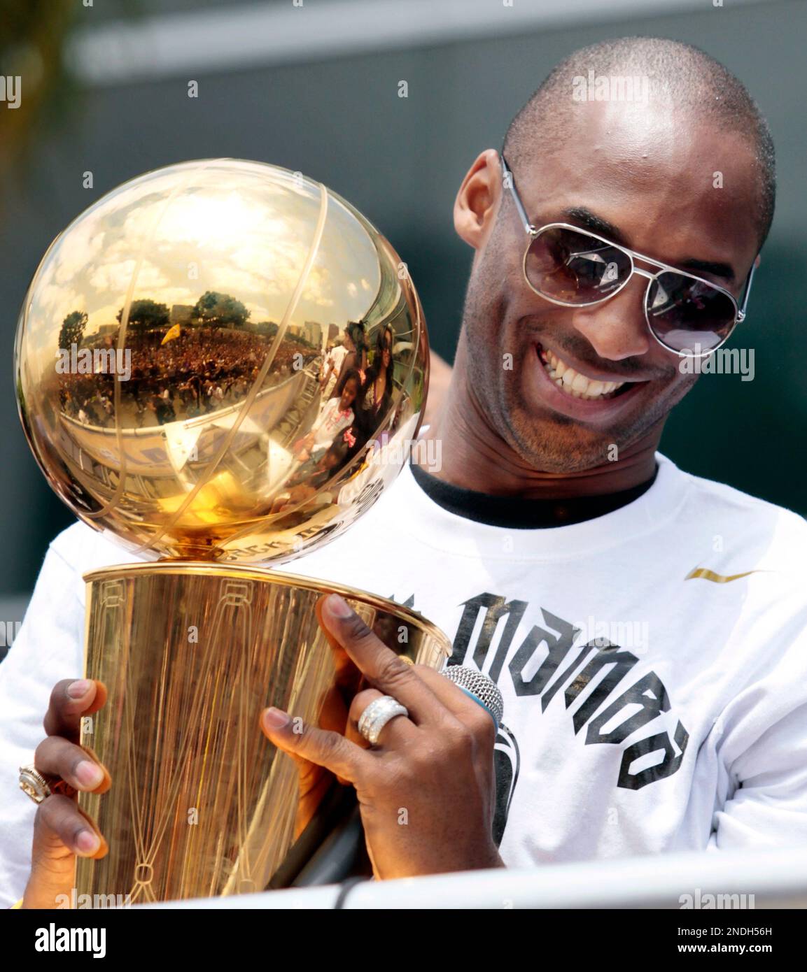 Holding the NBA championship trophy, Los Angeles Lakers' Kobe Bryant during  a parade in downtown Los Angeles on Monday, June 21, 2010. (AP  Photo/Richard Vogel Stock Photo - Alamy