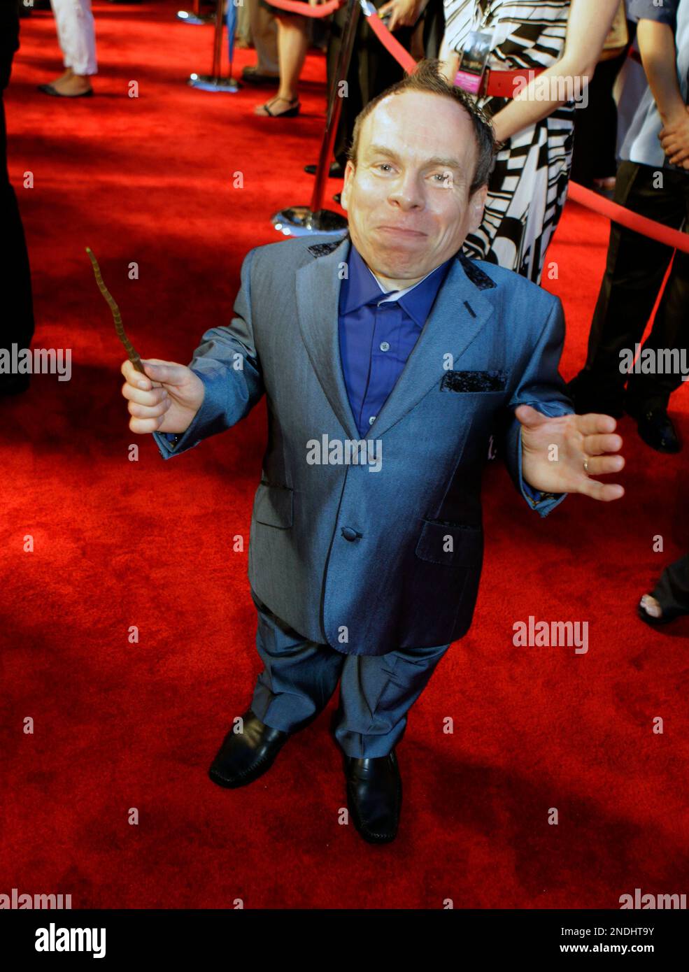 Actor Warwick Davis , who plays the part of Professor Filius Flitwick in the Harry Potter films, attends the grand opening celebration at the Wizarding World of Harry Potter at Universal Orlando Resort theme park in Orlando, Fla., Wednesday, June 16, 2010.(AP Photo/John Raoux) Stock Photo