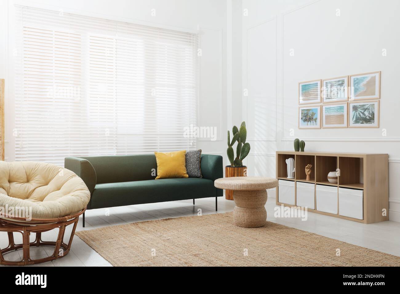 Comfortable sofa in modern living room. Interior design Stock Photo - Alamy