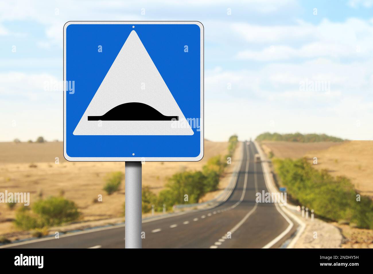 Sign Speed Bump near asphalt road outdoors Stock Photo Alamy