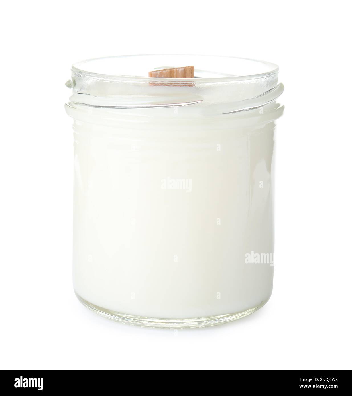 Beautiful candle with wooden wick isolated on white Stock Photo Alamy