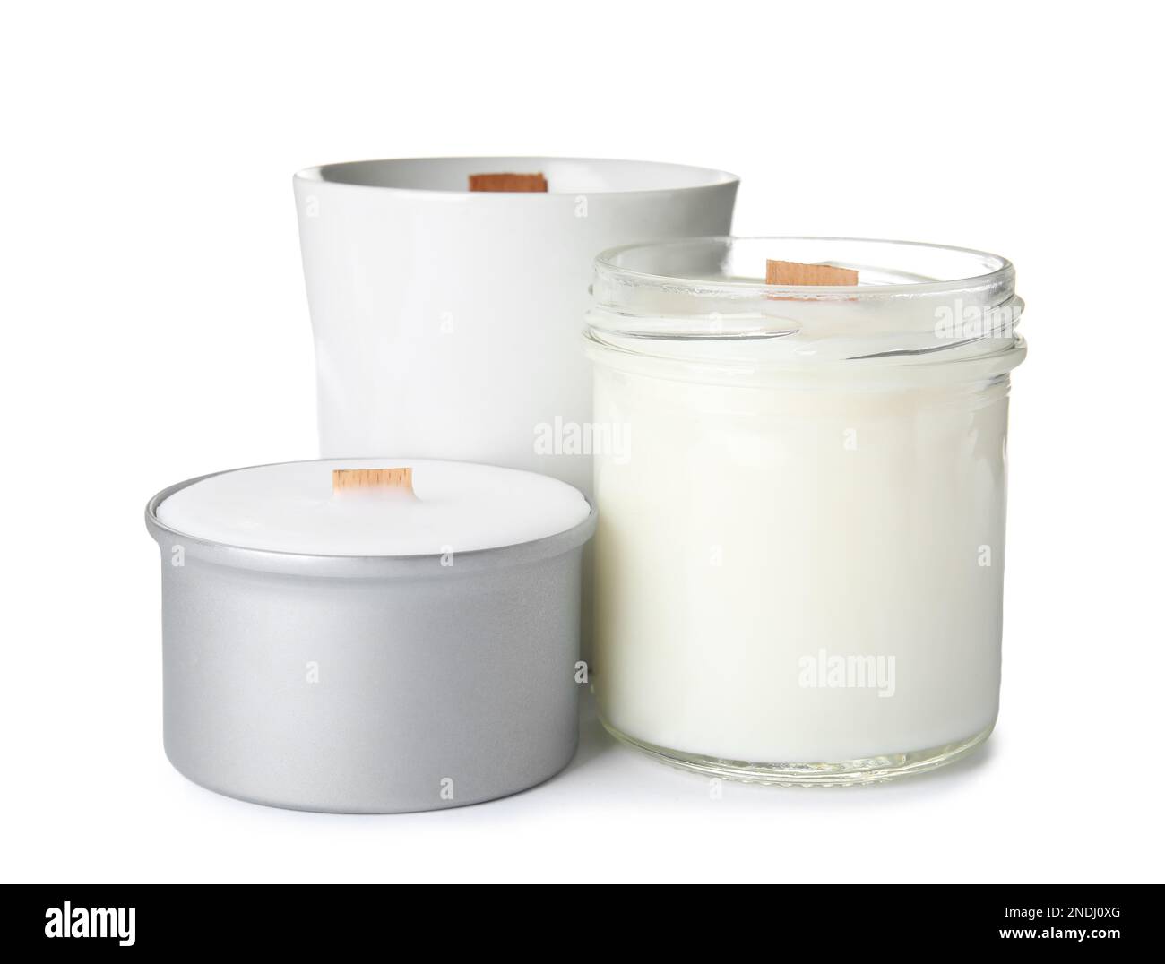Beautiful candles with wooden wicks on white background Stock Photo Alamy