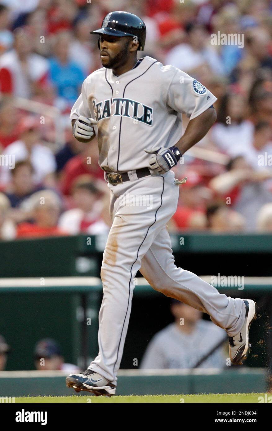 Seattle Mariners' Milton Bradley rounds the bases on a solo home run ...