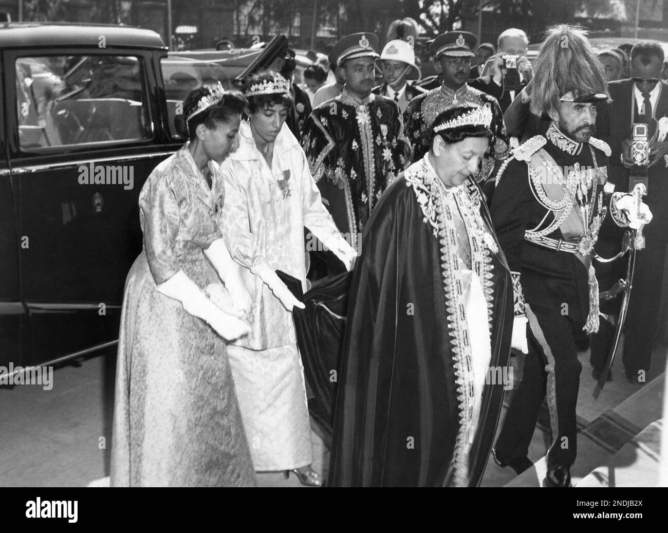 Emperor Haile Selassie of Ethiopia and his empress are in royal regalia ...