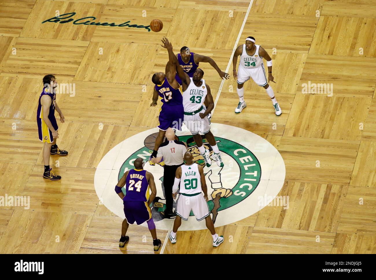 Los Angeles Lakers center Andrew Bynum (17) and Boston Celtics center Kendrick Perkins (43) tip off Game 5 of the NBA basketball finals Sunday, June 13, 2010, in Boston. (AP Photo/Charles Krupa) Stock Photo