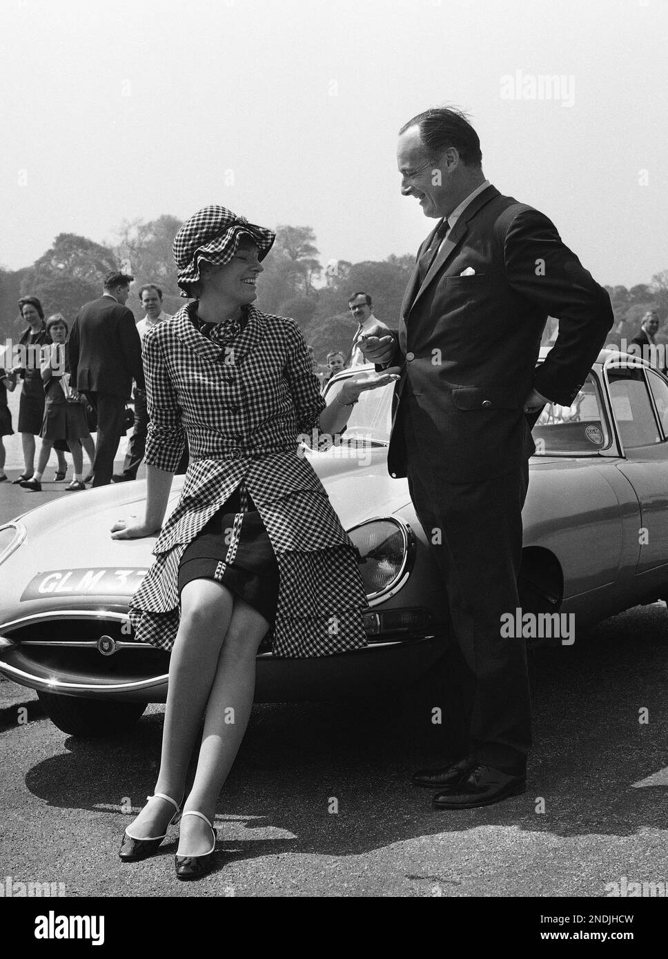 World land and water speed record holder, Donald Campbell, hands over to his wife, Tonia Bern