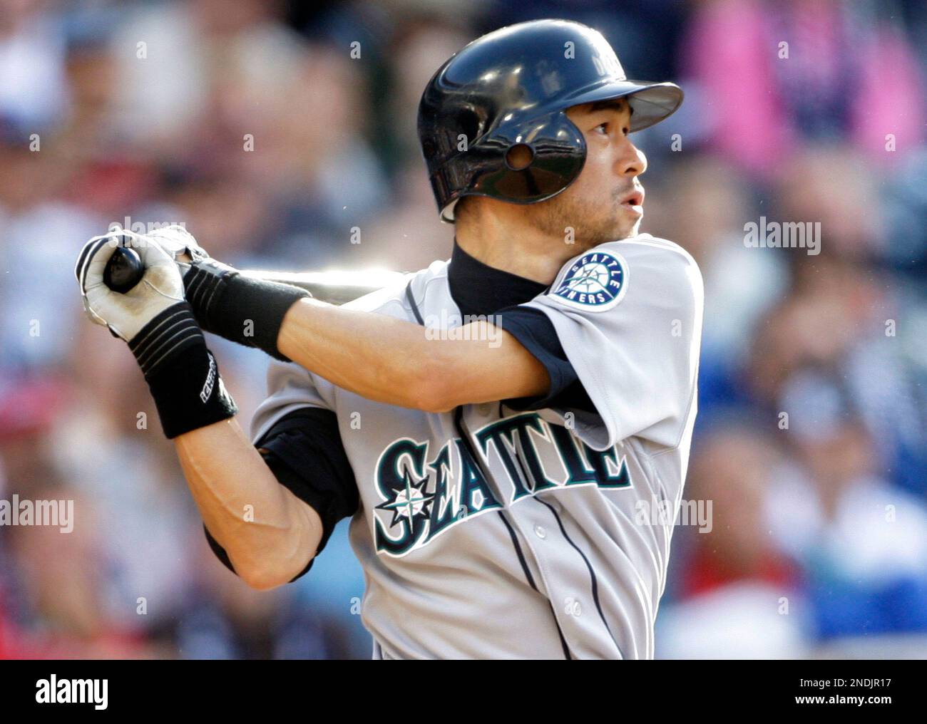Seattle Mariners' Ichiro Suzuki eyes his soft liner that falls in for a  single in the first inning against the San Diego Padres of a baseball game  Saturday, June 12, 2010. (AP