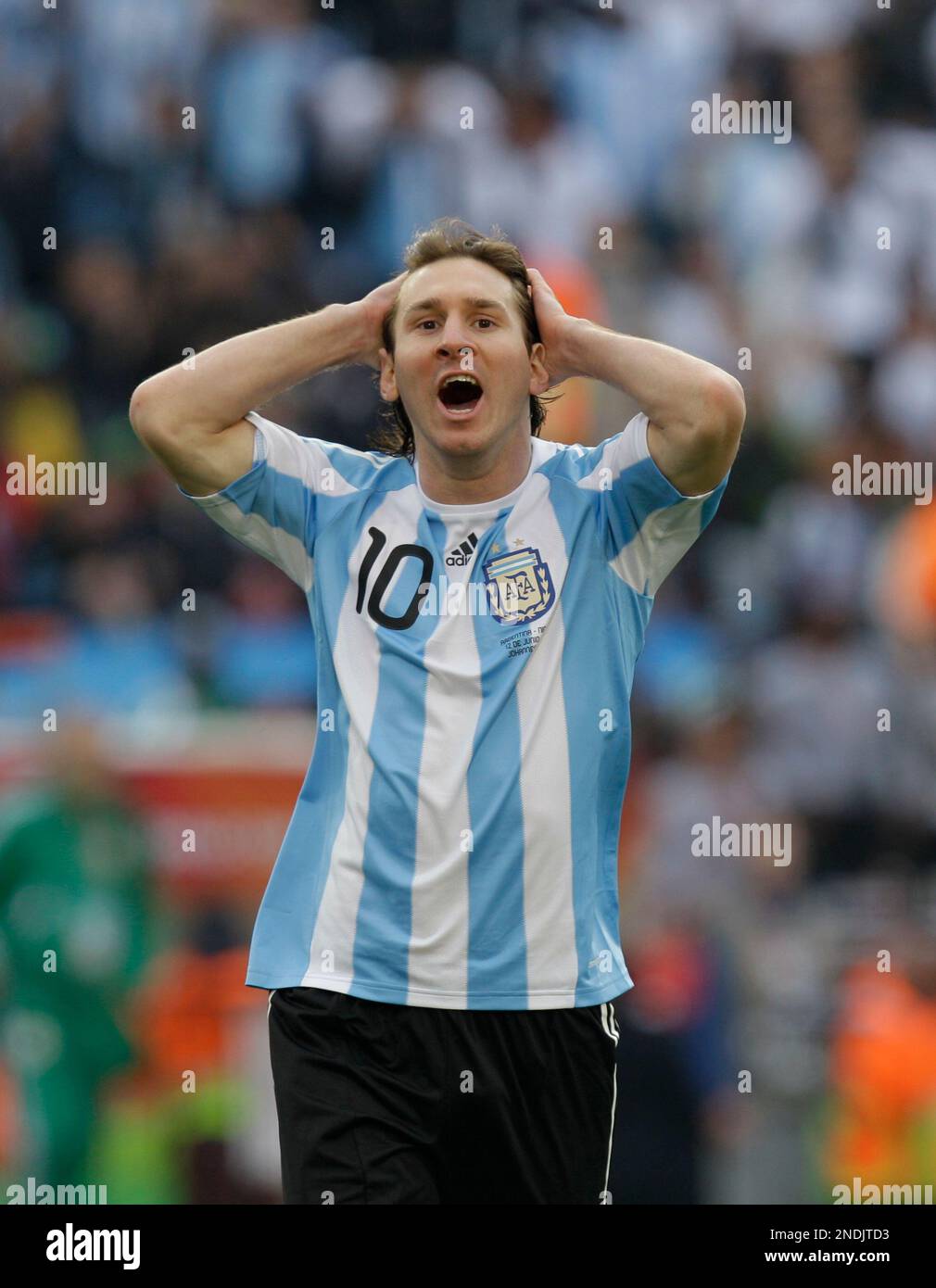 Argentina's Lionel Messi reacts during the World Cup group B soccer match  between Argentina and Nigeria at Ellis Park Stadium in Johannesburg, South  Africa, on Saturday, June 12, 2010. (AP Photo/Rick Bowmer, image size:1010x1390