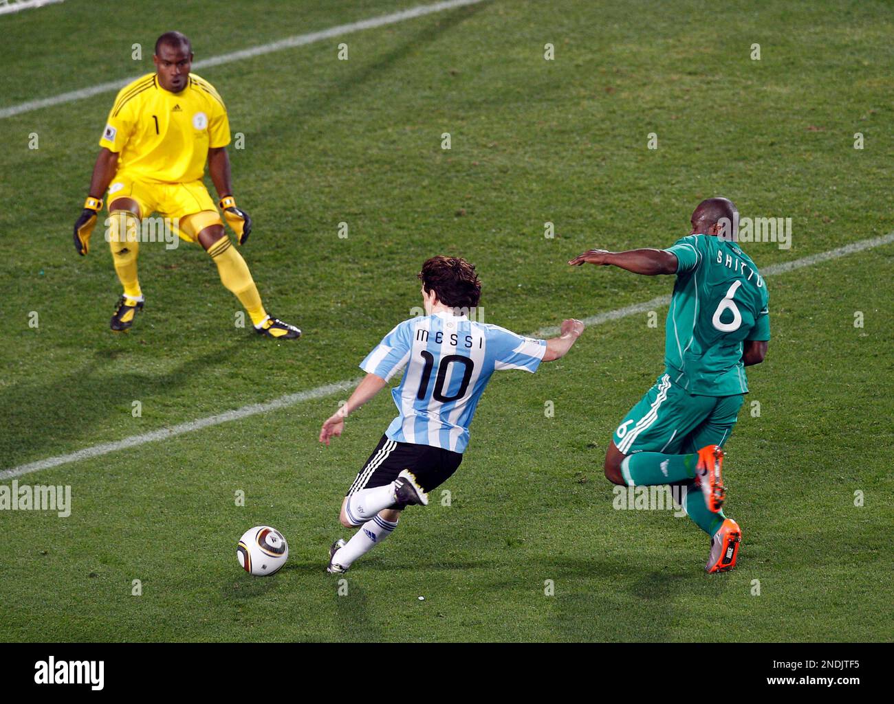 Argentina's Lionel Messi shots on goal during the World Cup group B