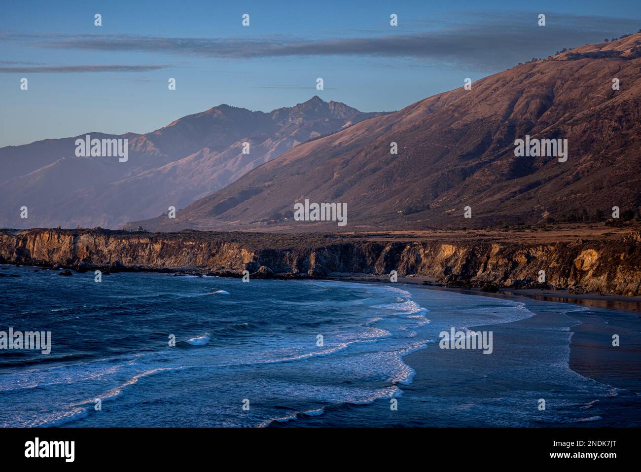 Sand Dollar Beach and Cone Peak on the South Coast of Big Sur CA during sunset. Stock Photo