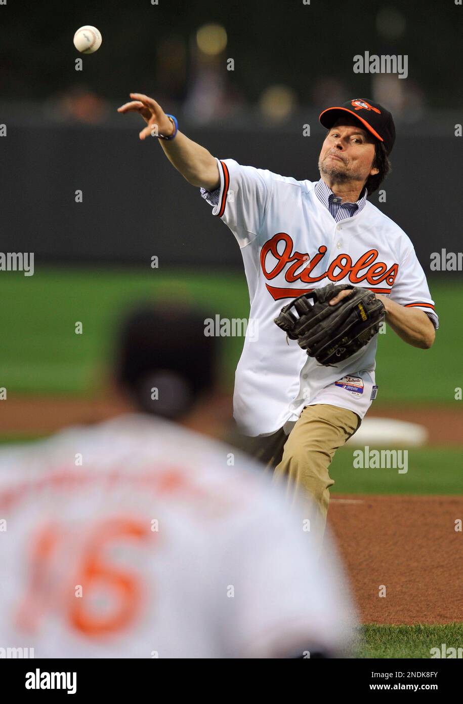 Documentary filmmaker Ken Burns throws out the first pitch before the New York Yankees-Baltimore Orioles baseball game Wednesday, June 9, 2010, in Baltimore