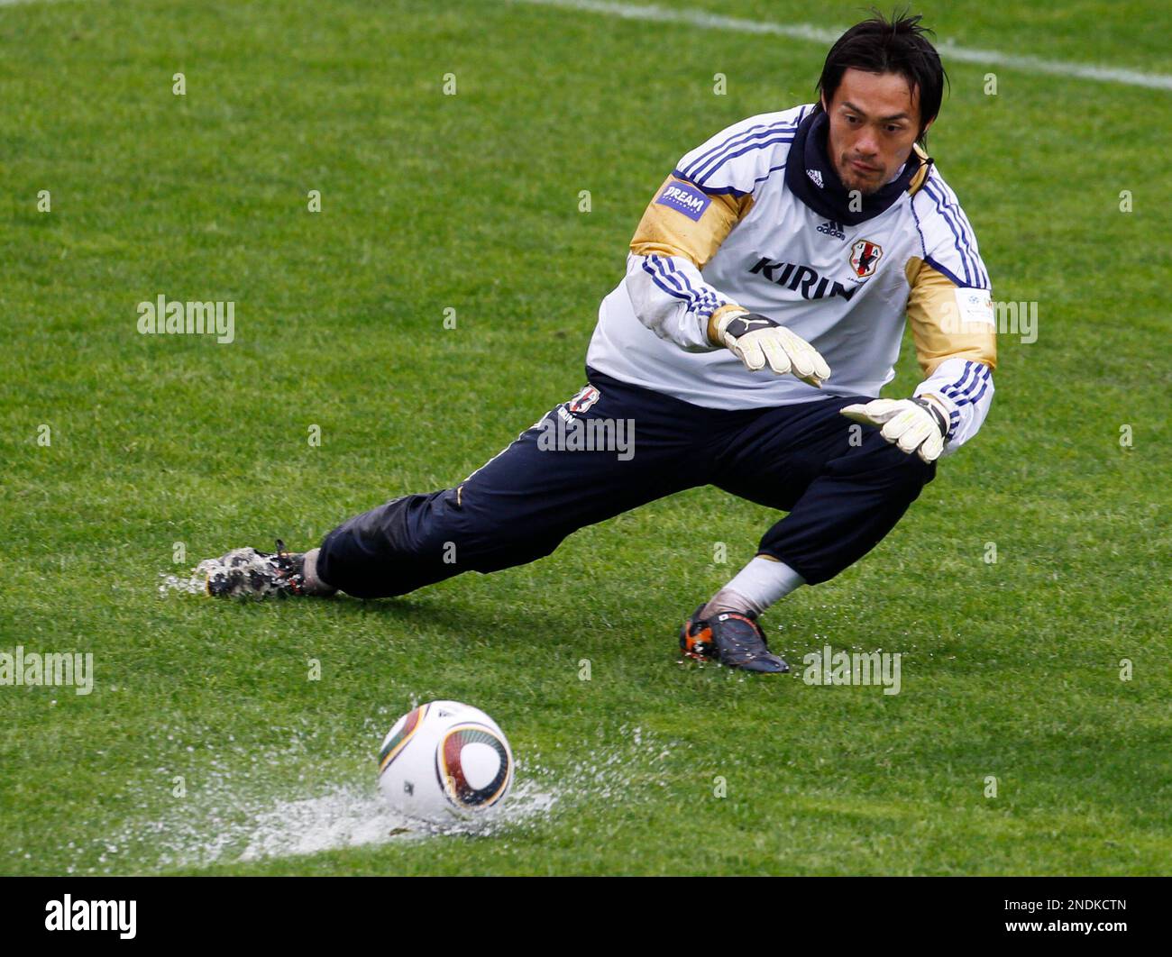 Japan's goalkeeper Seigo Narazaki eyes on the ball for a save during a  training session of the Japanese national team at Outeniqua Park in George,  South Africa Wednesday, June 9, 2010. Japan