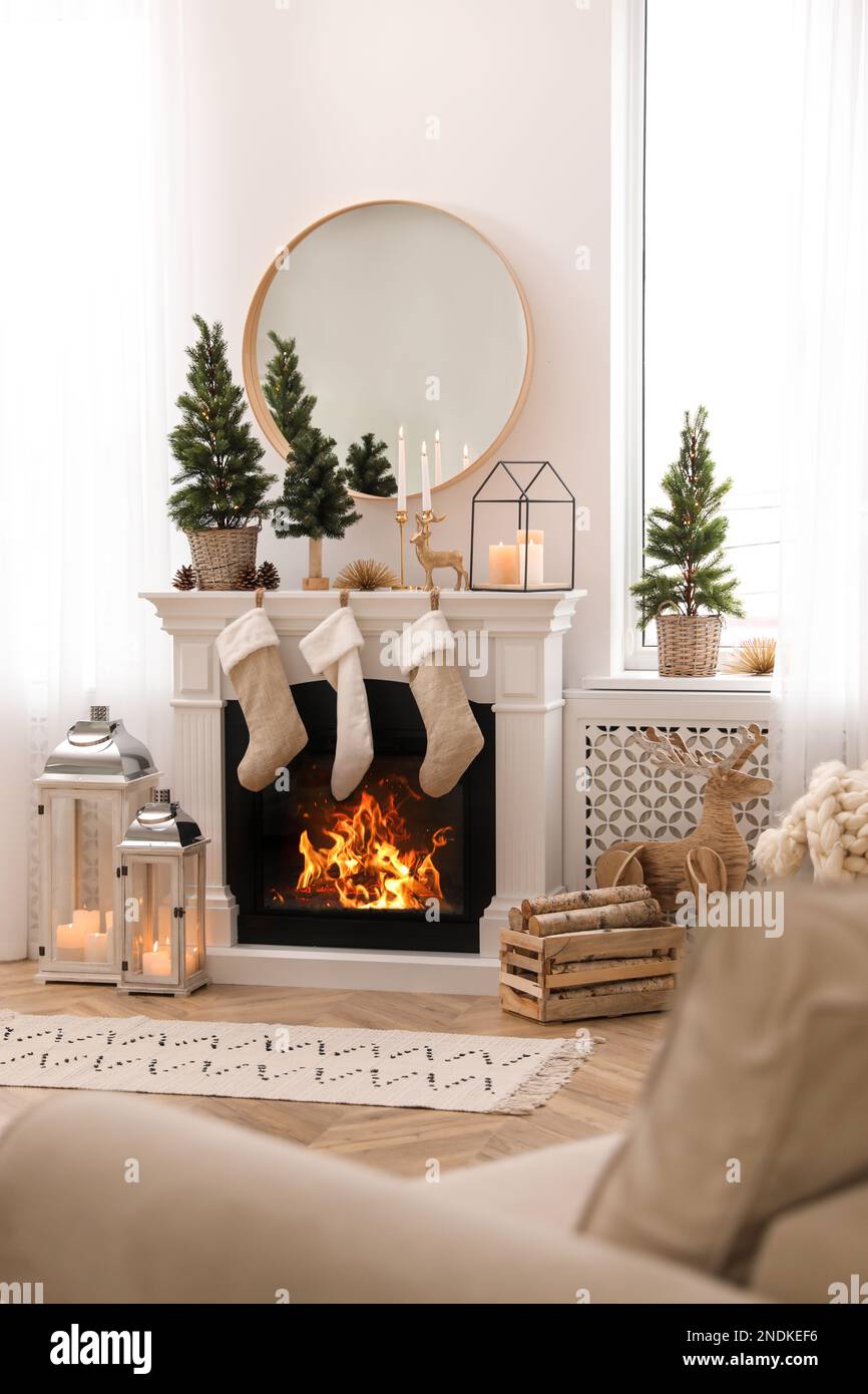 Fireplace in room with Christmas decorations. Interior design Stock ...
