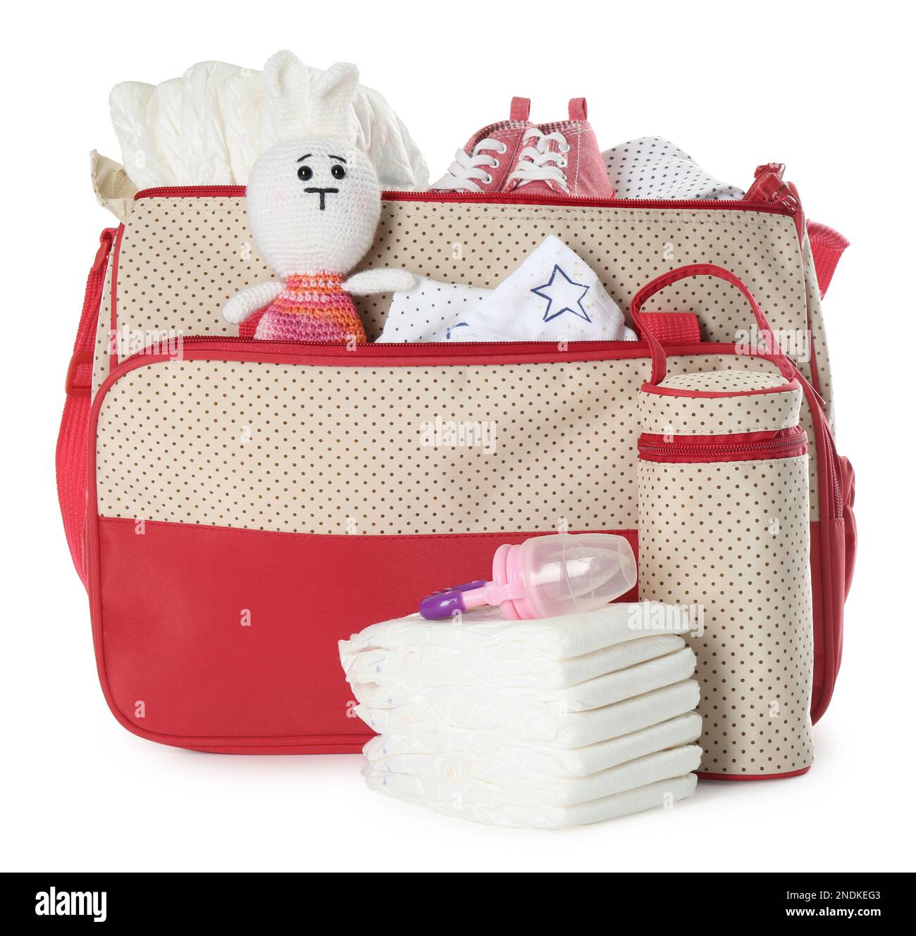 Mother's bag with baby's stuff isolated on white Stock Photo Alamy