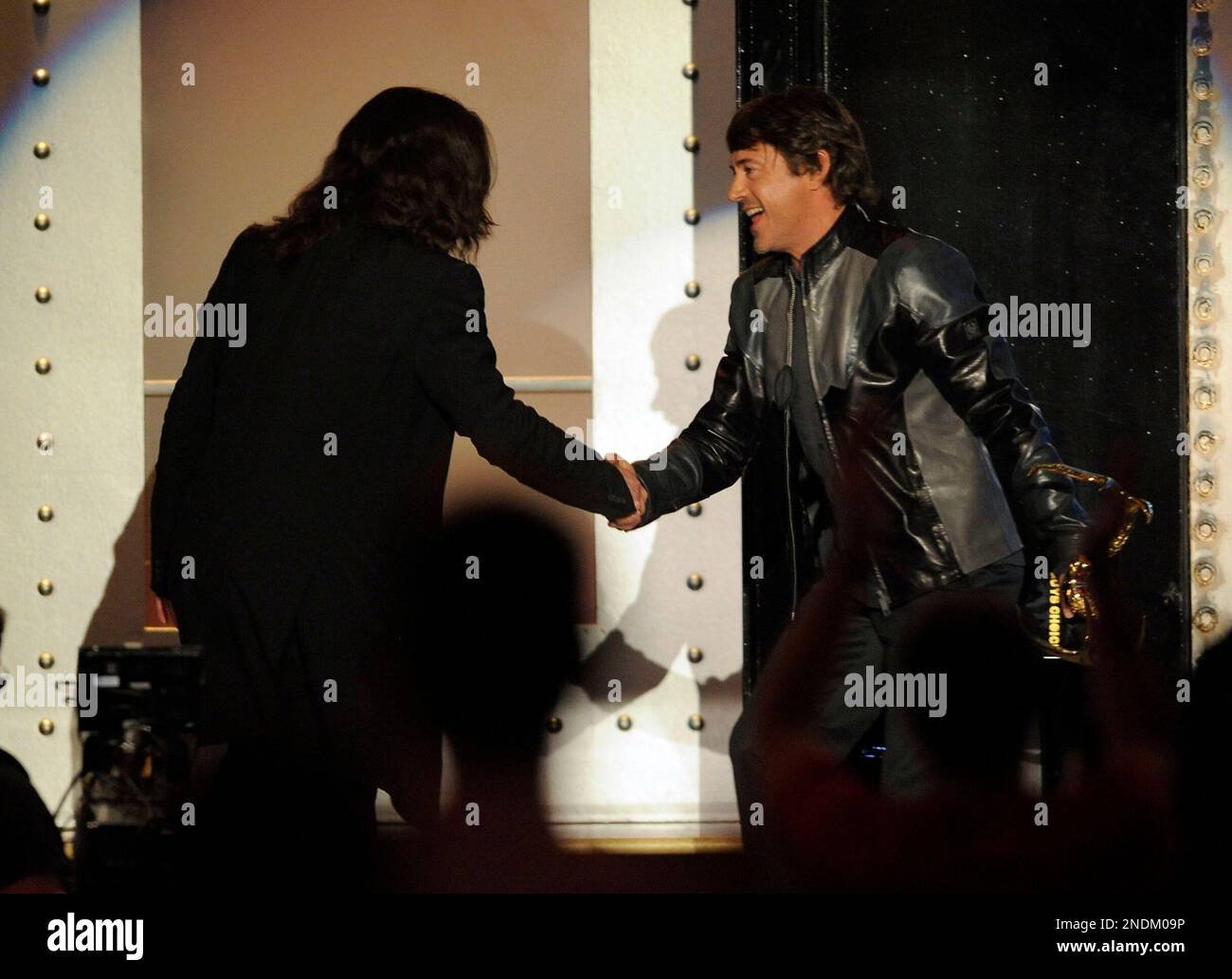 Robert Downey Jr., right, accepts the award for Deadliest Warrior from ...