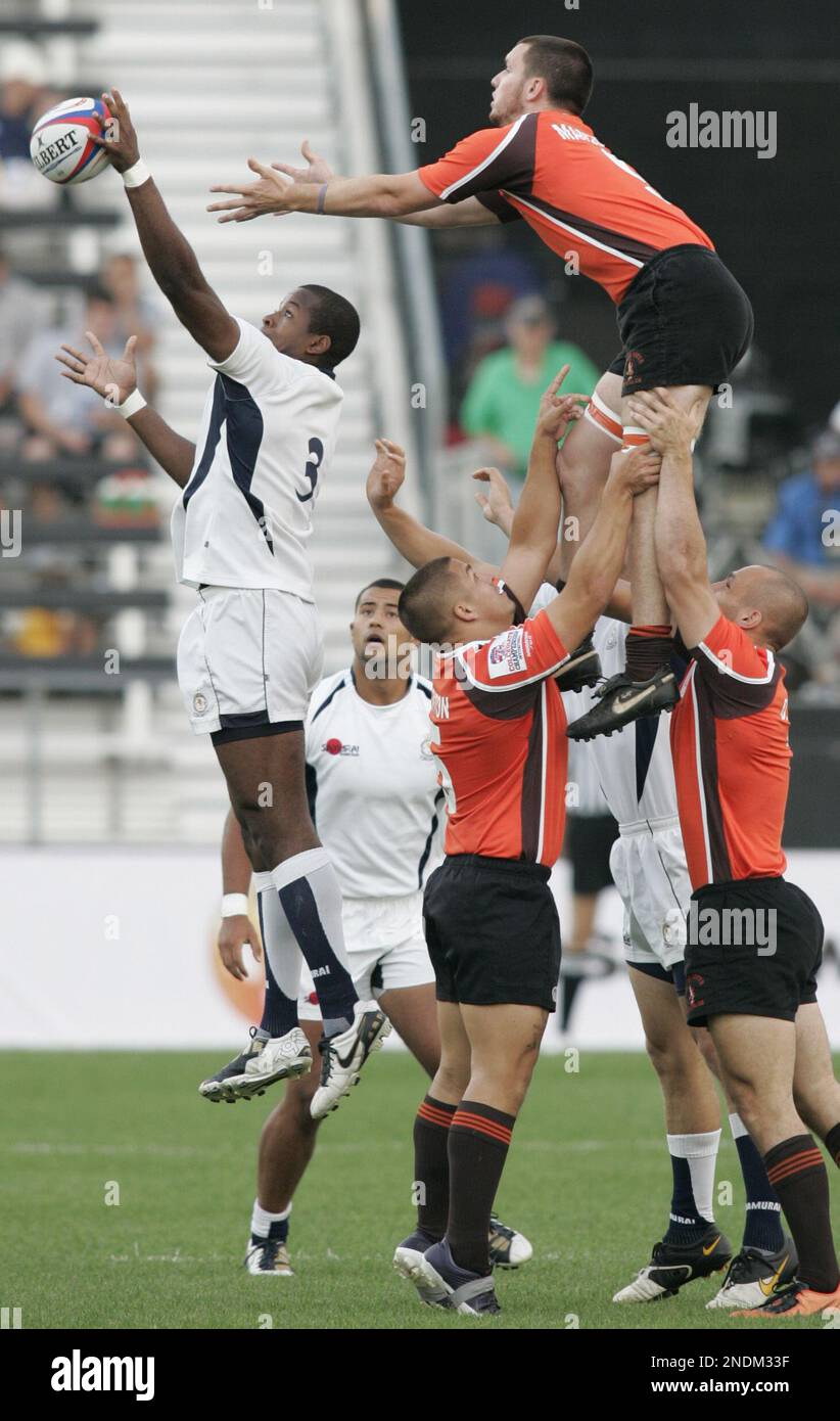 Penn State's Kevin Kimble, left, intercepts a pass intended for Bowling  Green's Ben Marshall, top, during a line-out in the first half of a USA 7's  Rugby Collegiate Championship Invitational match in