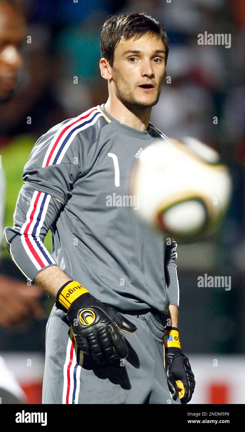 France's goalkeeper Hugo Lloris looks dejected after receiving a goal from China's Deng Zhuoxiang during their pre-Worldcup friendly soccer match at Michel Volnay stadium in Saint Pierre, Friday June 4, 2010 in the French overseas territory of La Reunion Island. France plays its last preparation match ahead of the World Cup 2010 in South Africa. (AP Photo/Francois Mori) Stock Photo