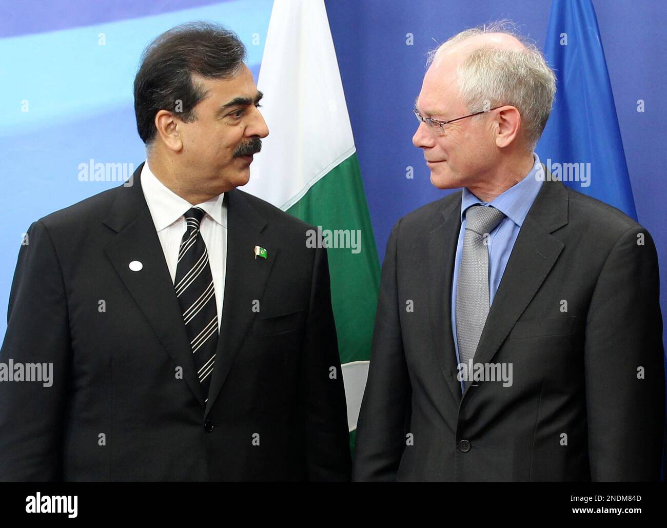 Pakistan's Prime Minister Syed Yousuf Raza Gilani, left, talks with ...
