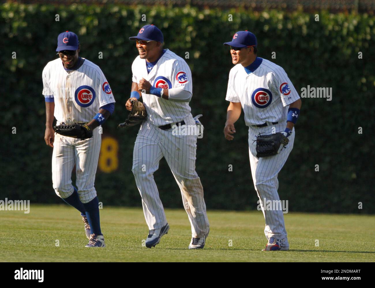 Chicago Cubs outfielders L to R Alfonso Soriano, Marlon Byrd and