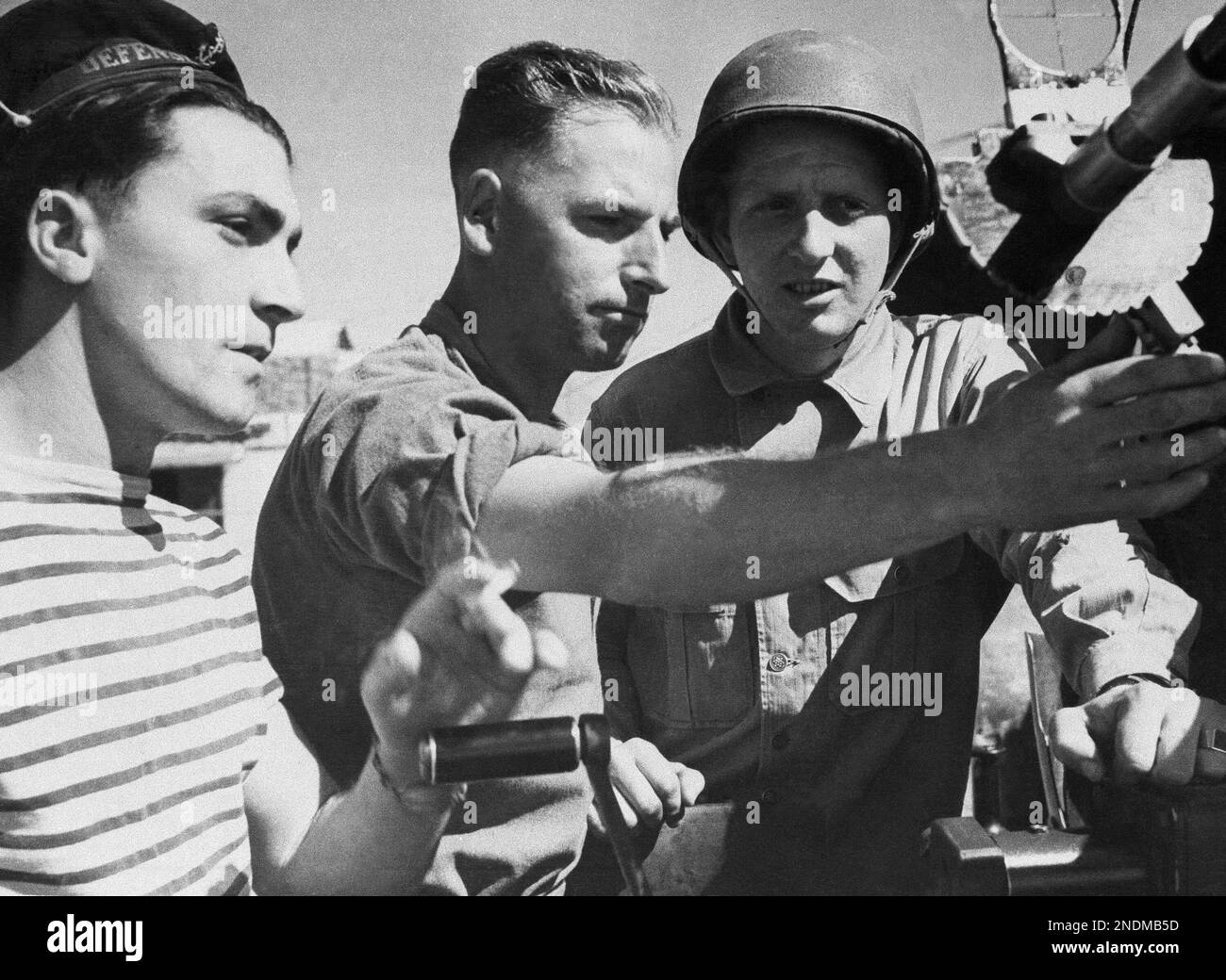 A French sailor, a British soldier and an American soldier (left to ...