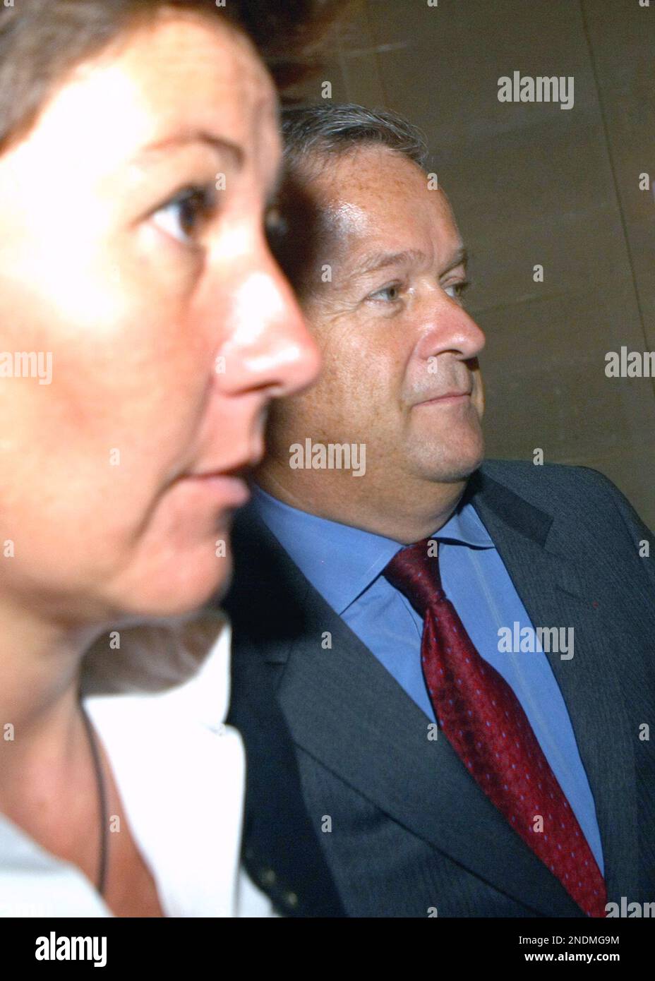 Jean Marie messier, former chairman and CEO of French conglomerate then  Vivendi International, leaves with Crystal Delaval, left, in the French  Court House in Paris Wednesday, June 2, 2010. The once-jettsetting Jean