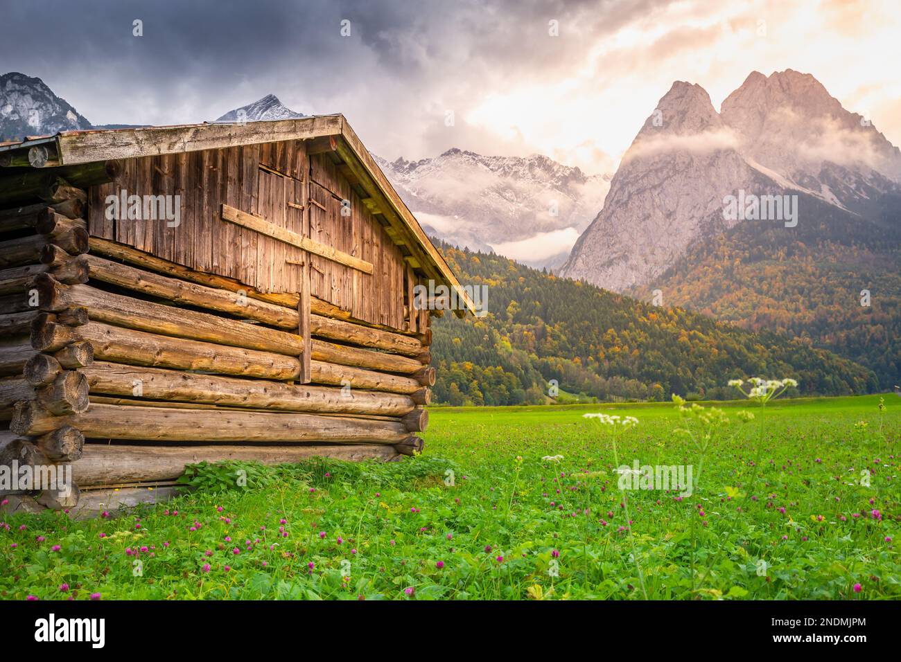 Bavarian alps and rustic farm barns, Garmisch Partenkirchen, Zugspitze ...