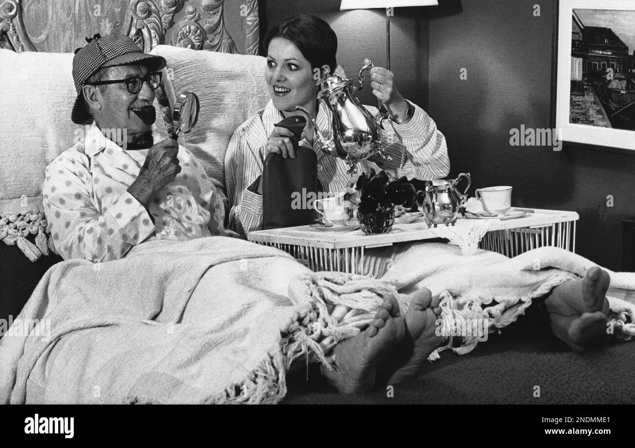 Comedian Groucho Marx, poses with Actress Lynn Redgrave in a bed in Los Angeles on March 18
